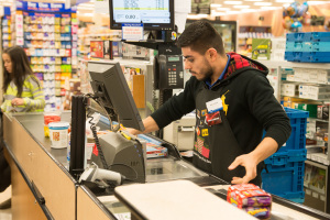Junior information systems major Wesam Ayoub scans groceries on an afternoon at the Kroger on Canton Road. Photo: Matt Boggs | The Sentinel