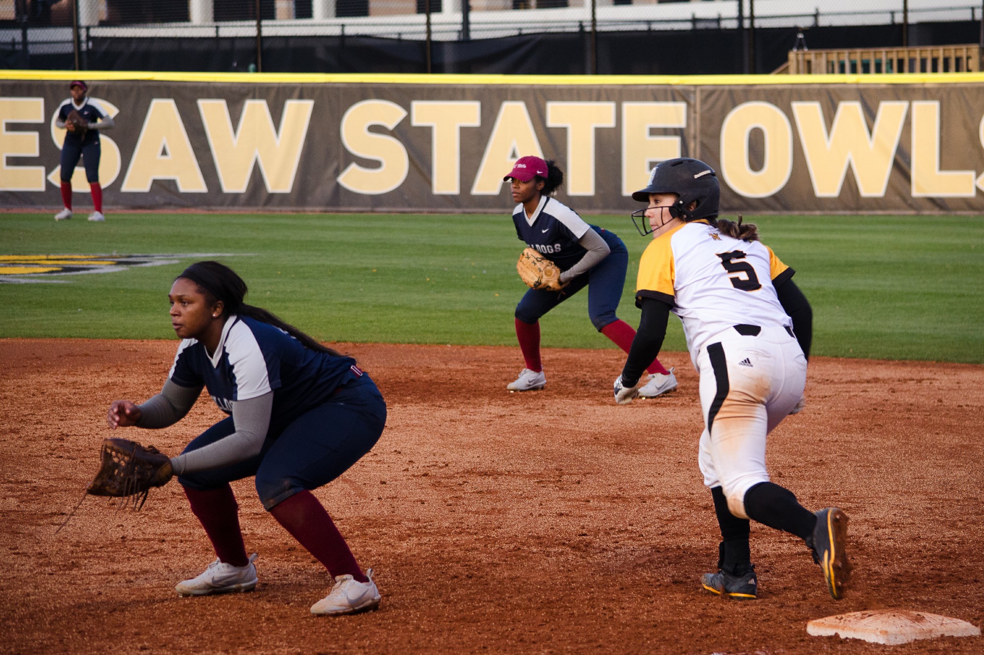 Softball splits doubleheader, comes out on top