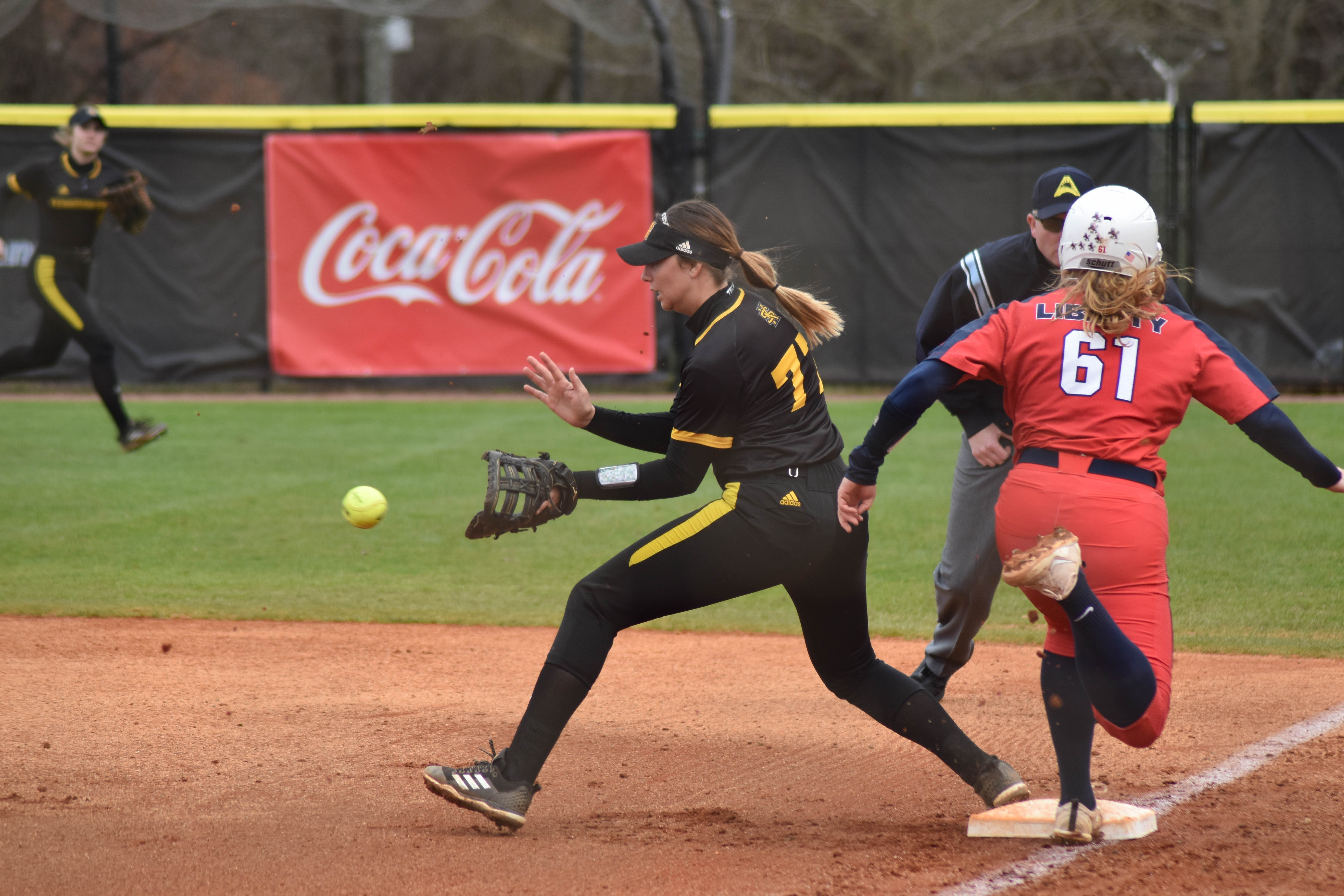 Softball rallies twice to douse Flames before falling in third game