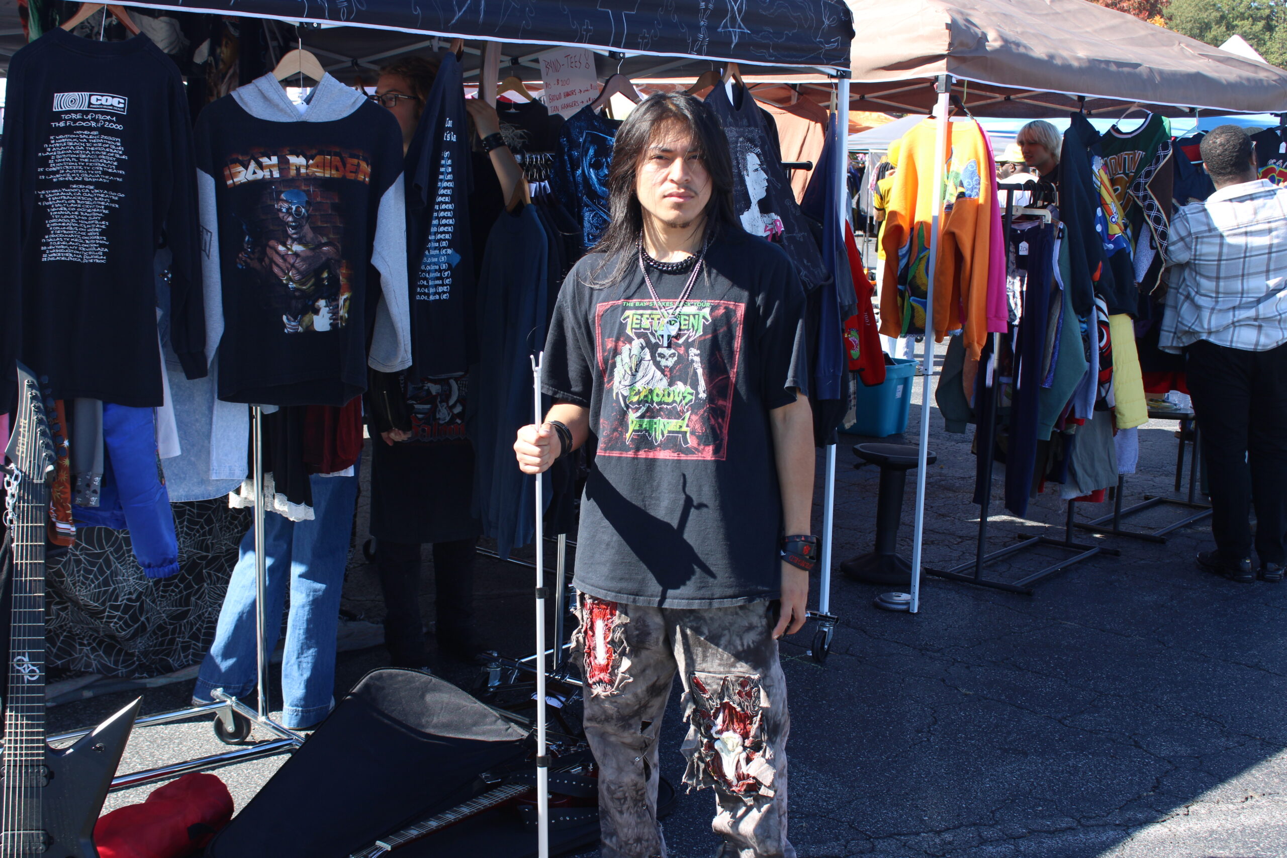 Clothing reseller Rubin Liggin, owner of Dismembered Threads, at his booth at the Ecologie Fall Festival.